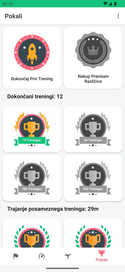 Zaslon »Pokali« v aplikaciji z dosežki za število dokončanih treningov in trajanje posameznega treninga.