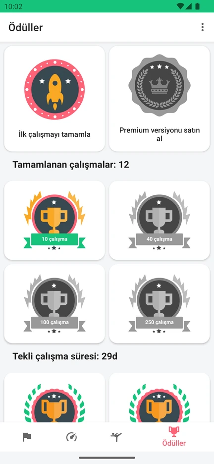 Uygulamanın Ödüller ekranı: tamamlanan çalışma sayısına ve tek çalışma süresine göre verilen rozetler.