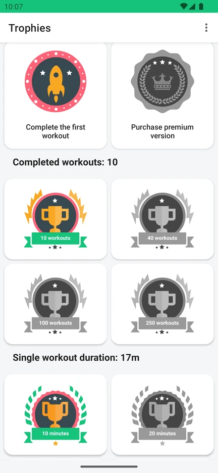 The app’s trophy screen with achievements for completed workouts and workout duration.